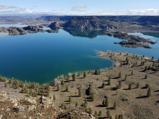 View toward northeast from north end atop Steamboat Rock. Boat-in only campsites are located along shore at end of small road at right.