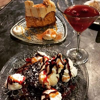 Lava cake with ice cream, raspberry martini, and pumpkin cheesecake