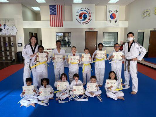 Congratulations on earning your new belt! You did it! Now it's time to work even HARDER!