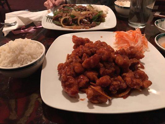 Orange Chicken fried perfectly and smothered in a delightful orange peel sauce. Amazing!