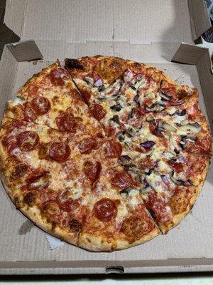 Large pepperoni with mushrooms and onions on half