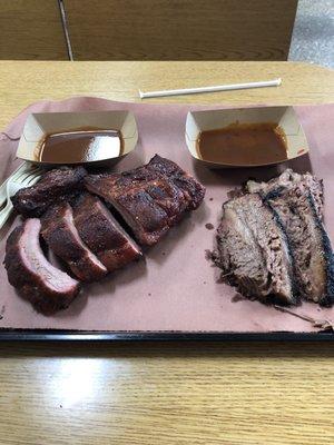 7 ribs, 1/2# of brisket spicy and regular sauce. Oh so good.