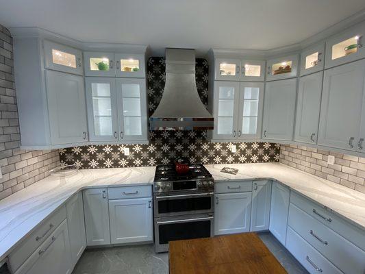 Full Kitchen remodel with new Kraftmaid Vantage cabinets, Cambria counters, Stoll Industries custom range hood.