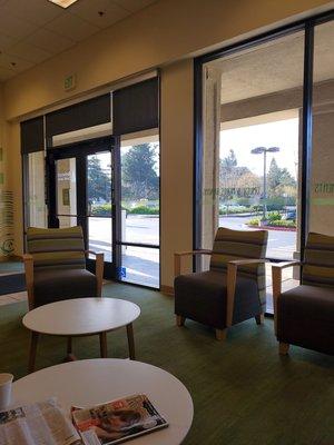 The waiting area at Redwood Credit Union, clean and has fresh complimentary coffee