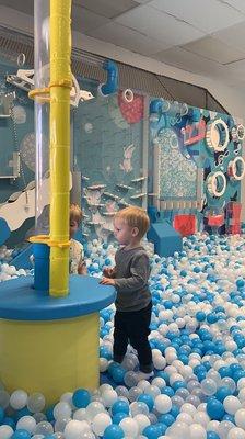 Ball pit with music and light up features