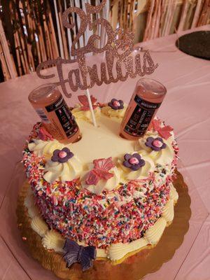 Vanilla birthday cake (I added the liquor bottles and birthday pick)