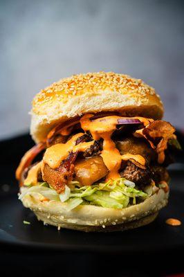 Nosh Burger: Bacon, Cheddar, Shredded Lettuce, Pickles, Red Onion, Nosh Sauce!