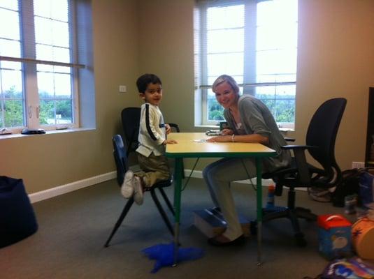 Our speech therapist working with a child.