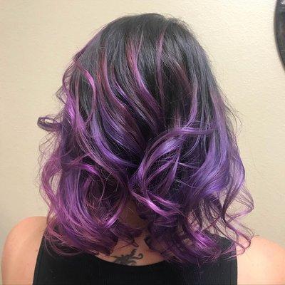 Fun fashion color pink an purple following a balayage.