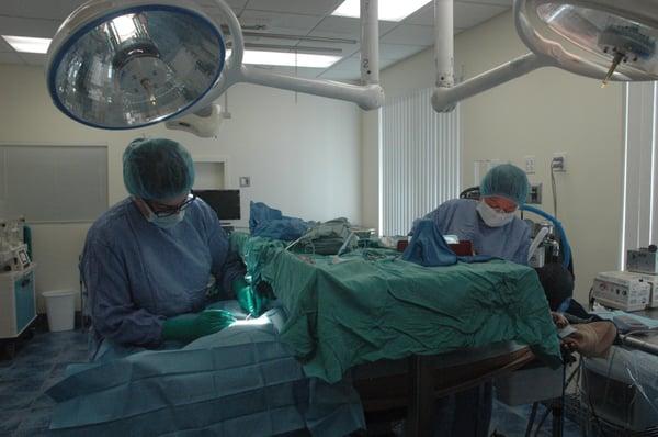 Two surgeons in action