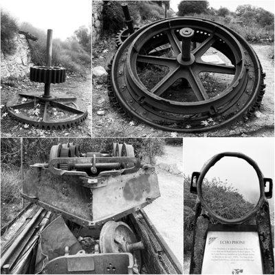 Old remains of rail car, cable wheel and echo phone.