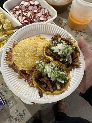 Two al pastor tacos and a suadero mulita