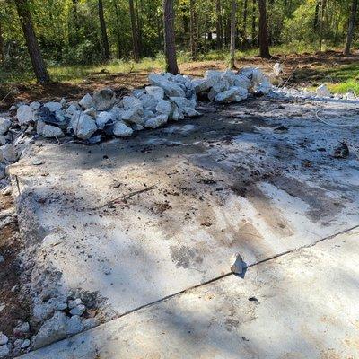 Conroe foundation repair poured a concrete slab that is not level and never finished removing it.