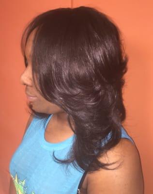 Soft layers. Custom sew-in hair extensions.