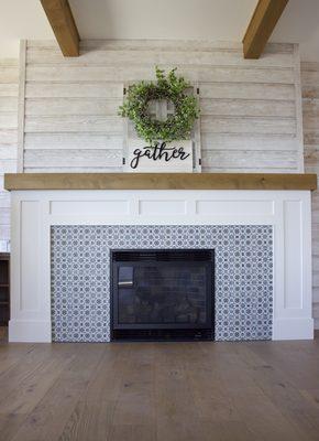 Shaw hardwood floors and deco tile create a modern farmhouse atmosphere in this Indian Trail home.