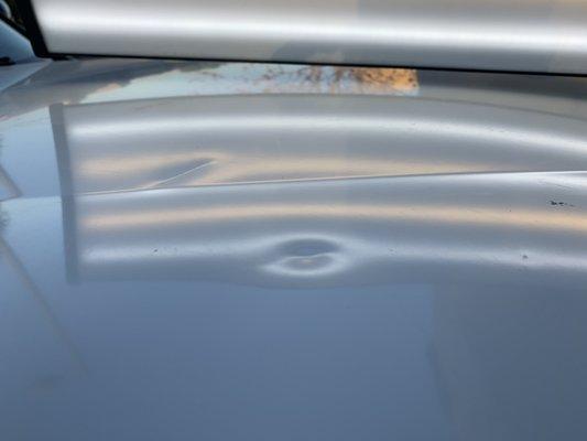 2" Crease & 2" Sharp Dent on this Nissan Hood