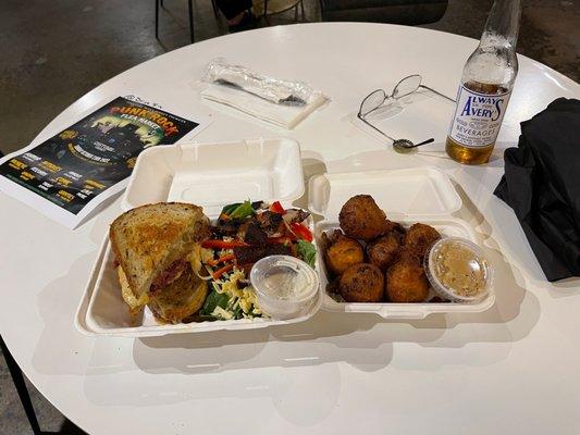 Reuben sandwich with side salad, hush puppies with maple butter, Avery's sarsaparilla