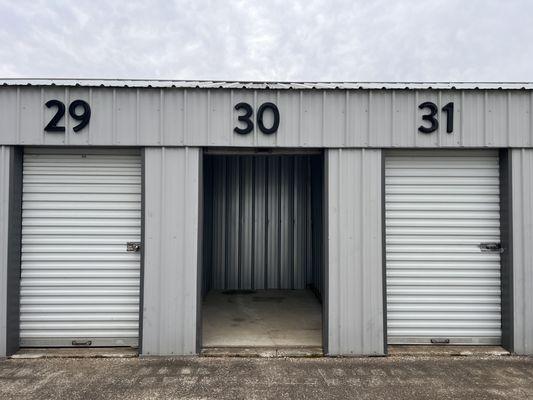 Outside and inside of F30 which is a 6'x10' mini storage unit at One Box Storage in Evansville, IN.