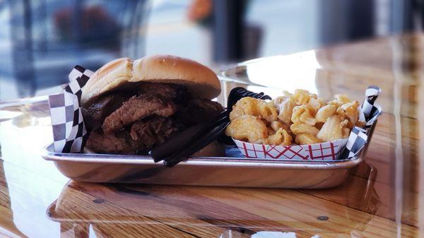 Here it is, art on a bun: Brisket Sandwich with Smoked Gouda Mac & Cheese.