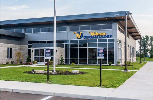 Wolverine Dermatology's main entrance accessorized with Hero Parking for our nation's active and veteran military heroes.