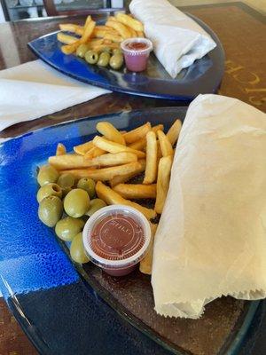 Shawarma plate with fries and olives