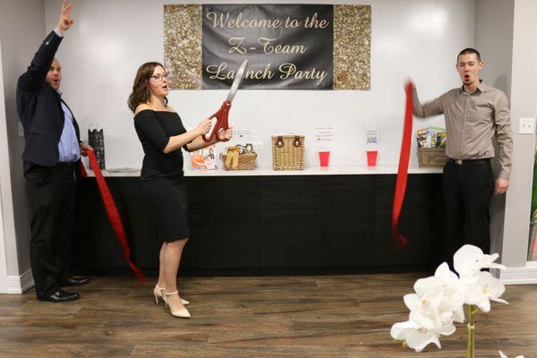 Cutting the ribbon at the launch party