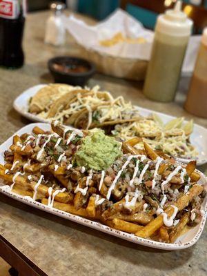 Cali fries and CRISPY shredded beef tacos! I moved from Cali and these taste like home! Thank you guys