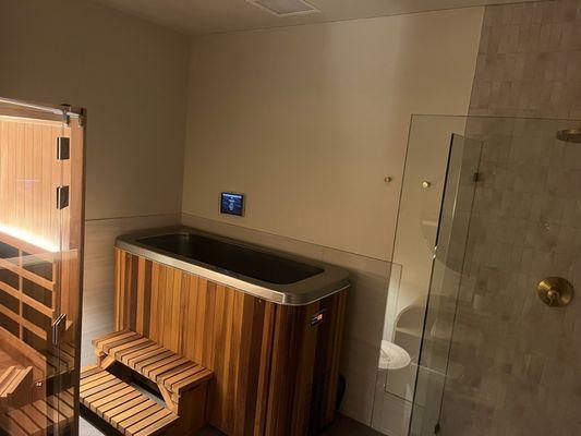 Cold plunge tub, shower, and infrared sauna all in the same private room