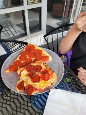 Deep dish and regular slices of pepperoni