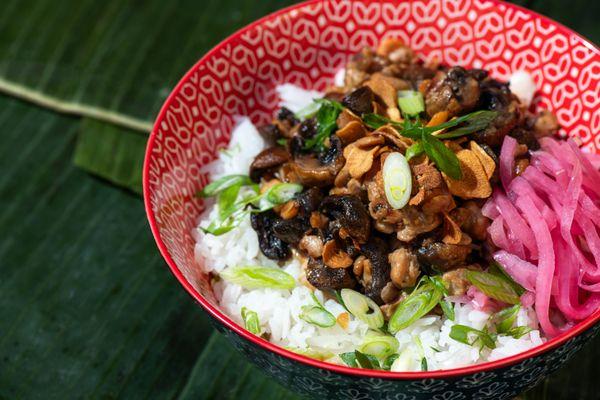 Mushroom and Tempeh Sisig Bowl, jasmine rice, pickled red onion, garlic chips, green onion