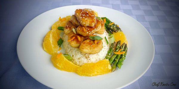 Vegan Mandarin Orange & Pomegranate Chicken Nuggets with Asparagus over Jasmine Rice