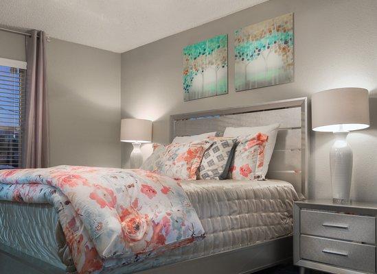 A Master bedroom inside The Huxley at Medical Center.