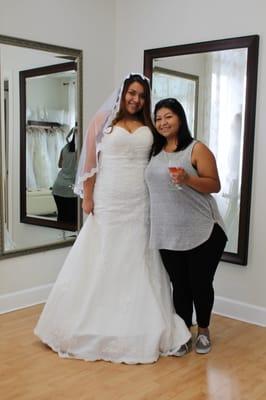 Cheers! The bride to be and her new bridal gown.