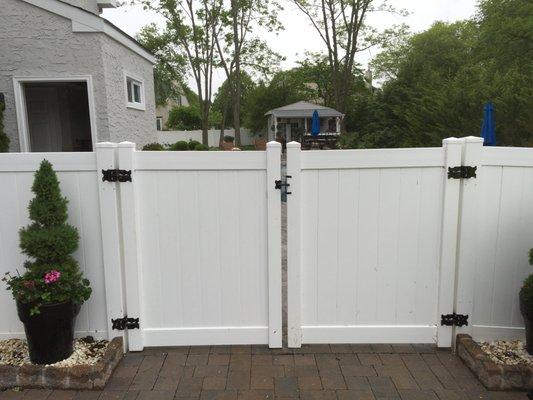 White PVC privacy fence.