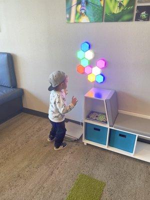 My son playing in the waiting area AFTER his appointment. He didn't want to leave