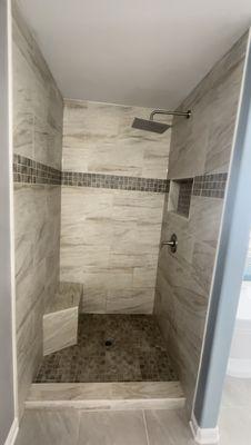 Custom Shower project. 

Showcasing a custom bench, niche, and rain shower head.