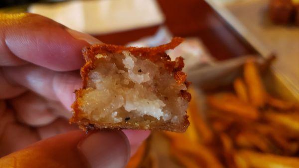 Interior of homemade tater tots ($5). More like cubed hash browns. Under seasoned, but I appreciated the effort.