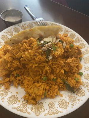 Biryani with chicken and saffron rice. My friend loved it and it is such a large portion he had leftovers to take home!