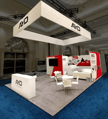 Custom-built trade show booth featuring interactive displays to captivate attendees and boost brand interaction.