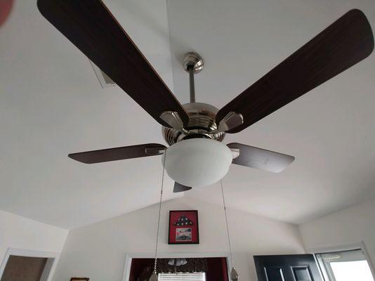 A ceiling fan we installed on a vaulted ceiling in a living room. We love how it turned out!