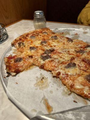 This is the "Ole Knight Long," pizza. (Sausage and pepperoni).