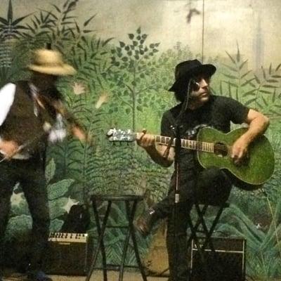 Playing @ The 6 & B Community Garden with Walter G. Steding on violin.