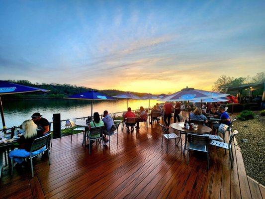 Back deck overlooking a sunset on the Ohio River.