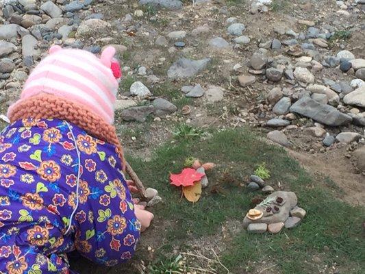 kindergarteners working on a fairy house