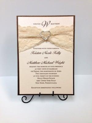 Bronze Pocket Invitation. Blush Shimmer, Cream Lace & Heart Buckle. Accessories Layer in pocket on back.