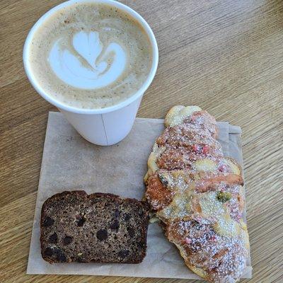 Vanilla Latte, Chocolate Chip Banana Bread, and Rose Pistachio Croissant