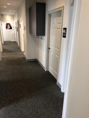 The hallway leading to our 5 star of art treatment rooms.