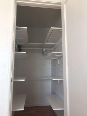 Walk-in closet shelvings and hanging rods installation.