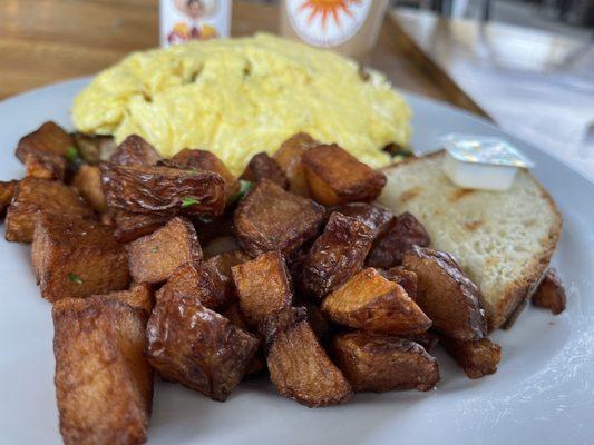 Veggie Omelette with Country Potatoes and an iced coffee. So good!