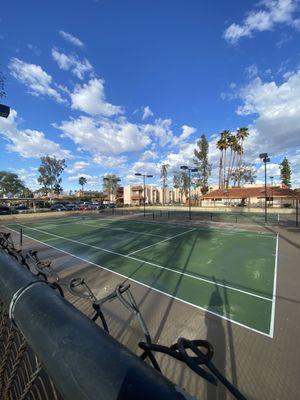 Unusable tennis courts with no nets for over 4 years.